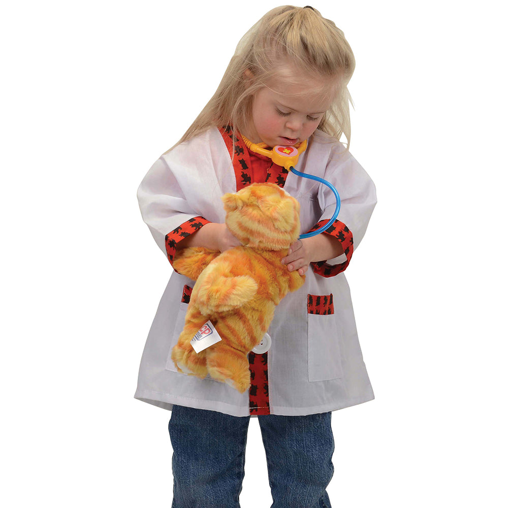 Child wearing vet coat with stuffed kitty toy
