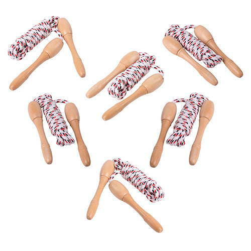 A set of six jump ropes with red and white ropes and beige handles laid out on a white background.
