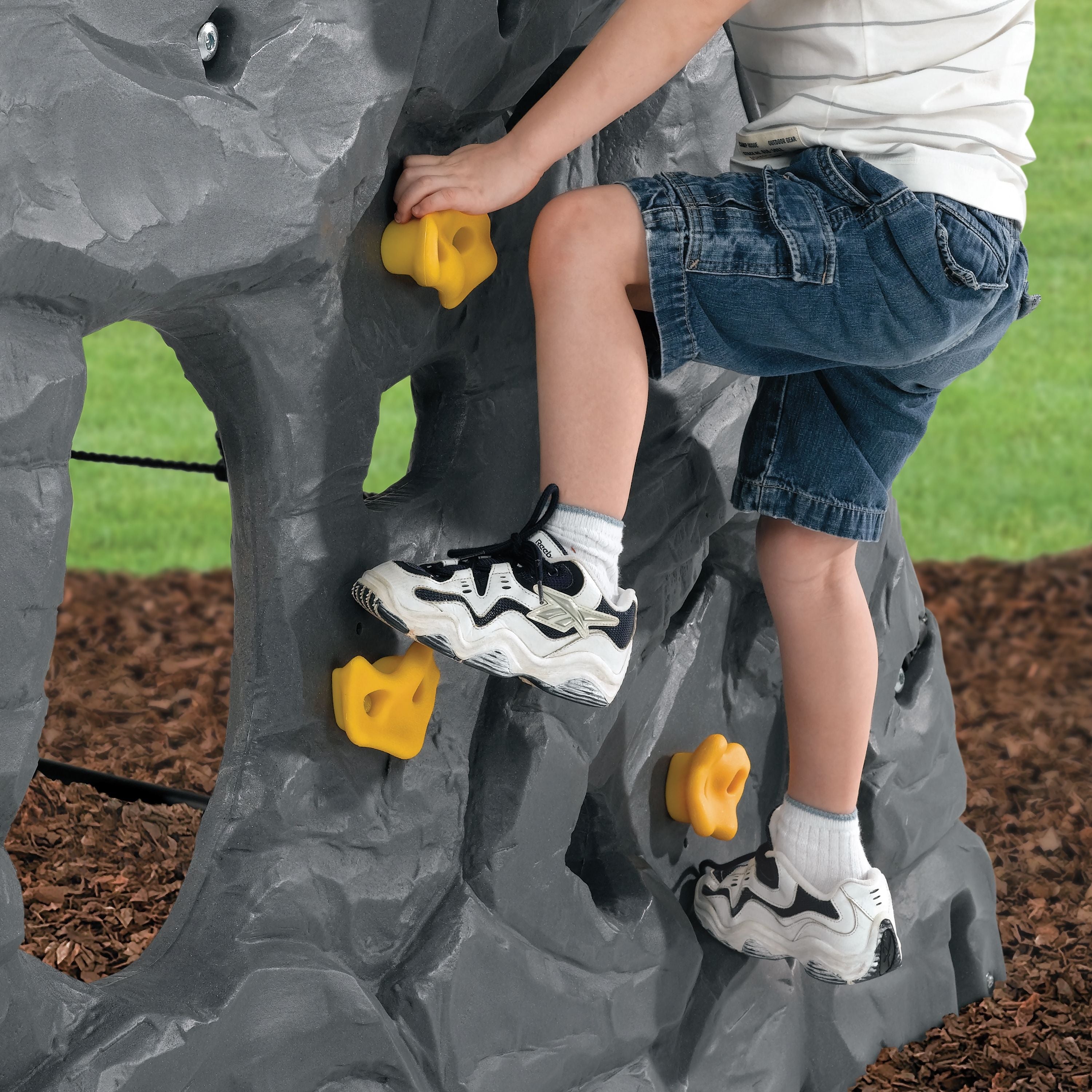 Using Grips to Climb Rock Wall