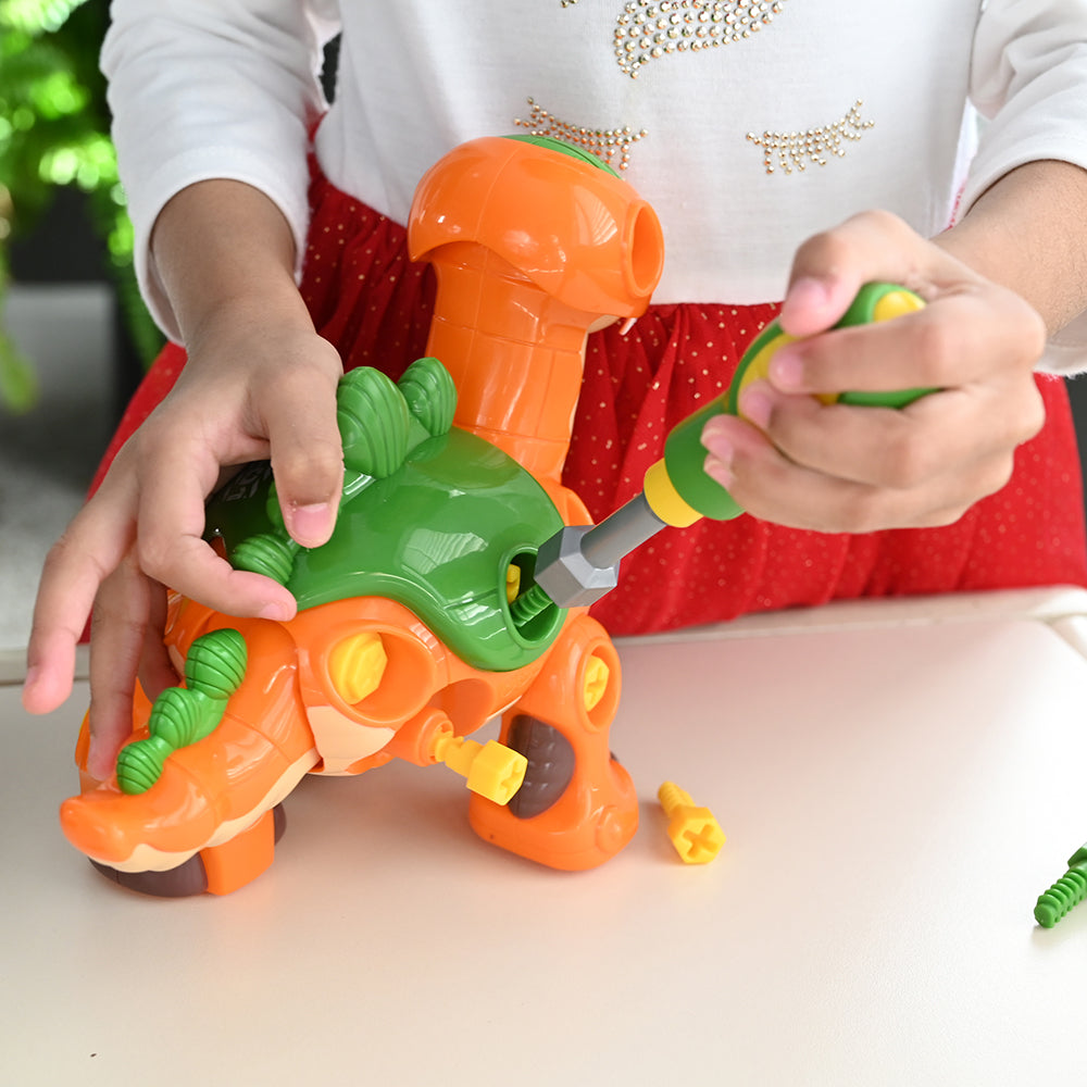 Kid Using Screwdriver to Create-A Stegosaurus
