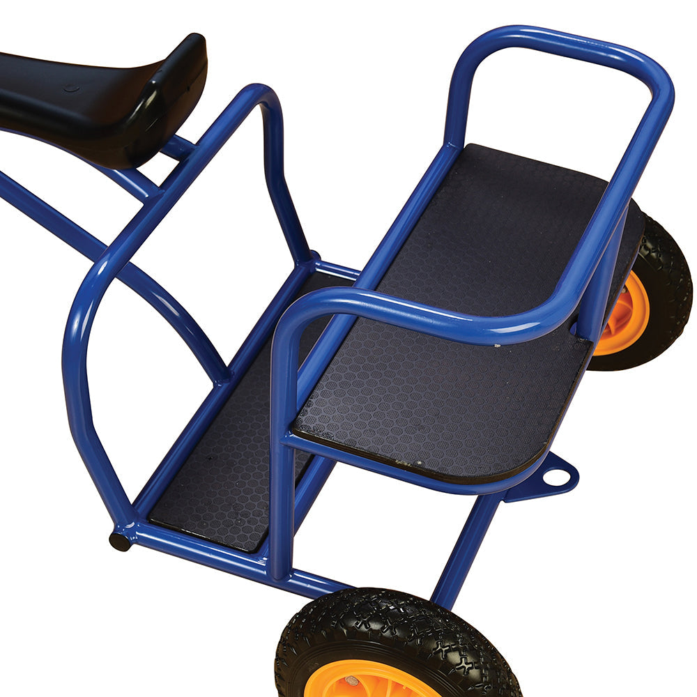 close-up of extra seat on tricycle