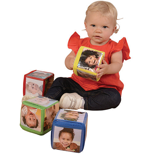 Baby Holding Blocks
