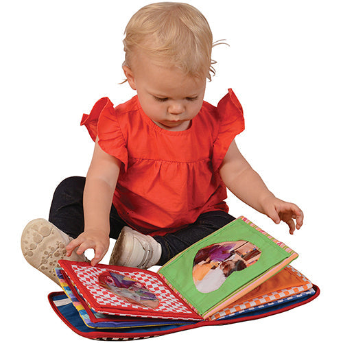 Baby Studying Baby's First Photo Album
