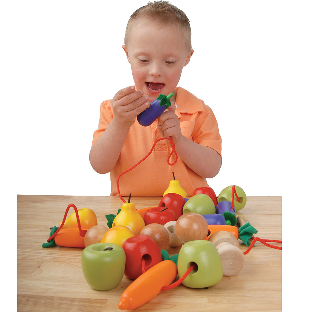 Working on Fine Motor Skills with Fruit & Vegetables Threading Activity