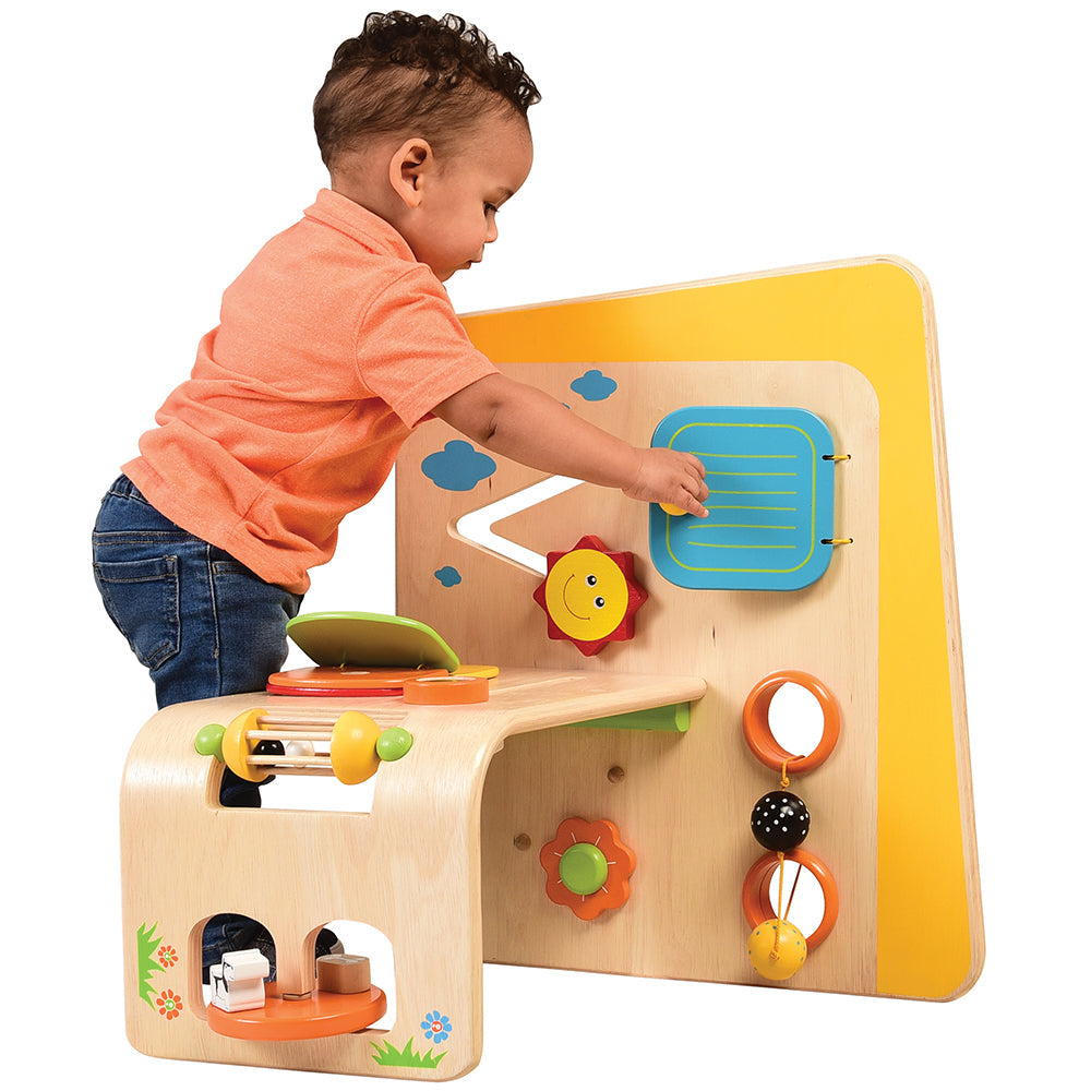 Toddler Playing With Early Exploration Panel