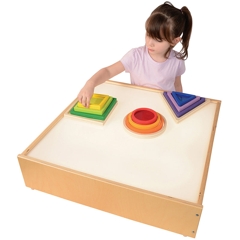Nesting Blocks On Top Of A Light Table