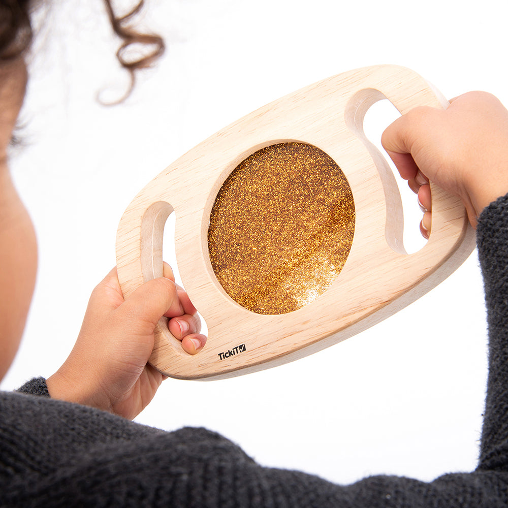Toddler Mesmerized with Easy to Grip Glitter Sensory Panel