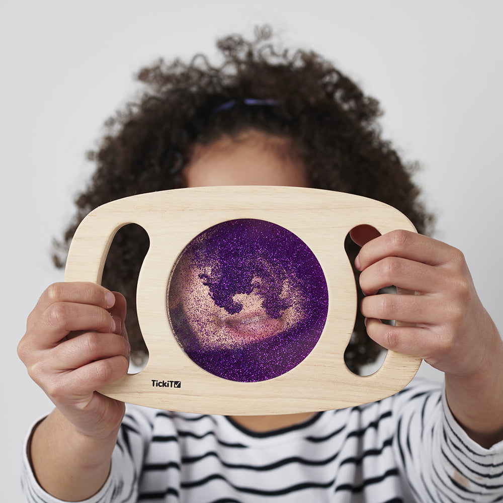 Swirling Purple Glitter in Sensory Exploration Panel