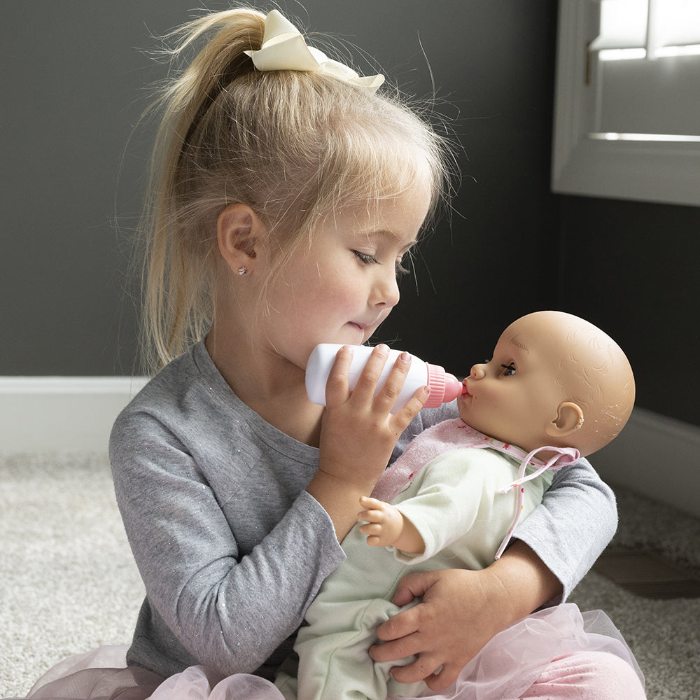 Feeding a Baby Doll a Bottle