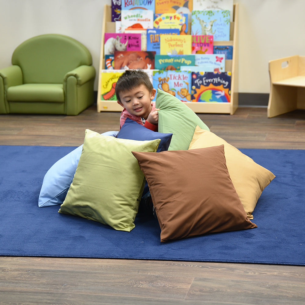 Child in a Classroom Surrounded by Natural & Calm Colors Oversized Pillows