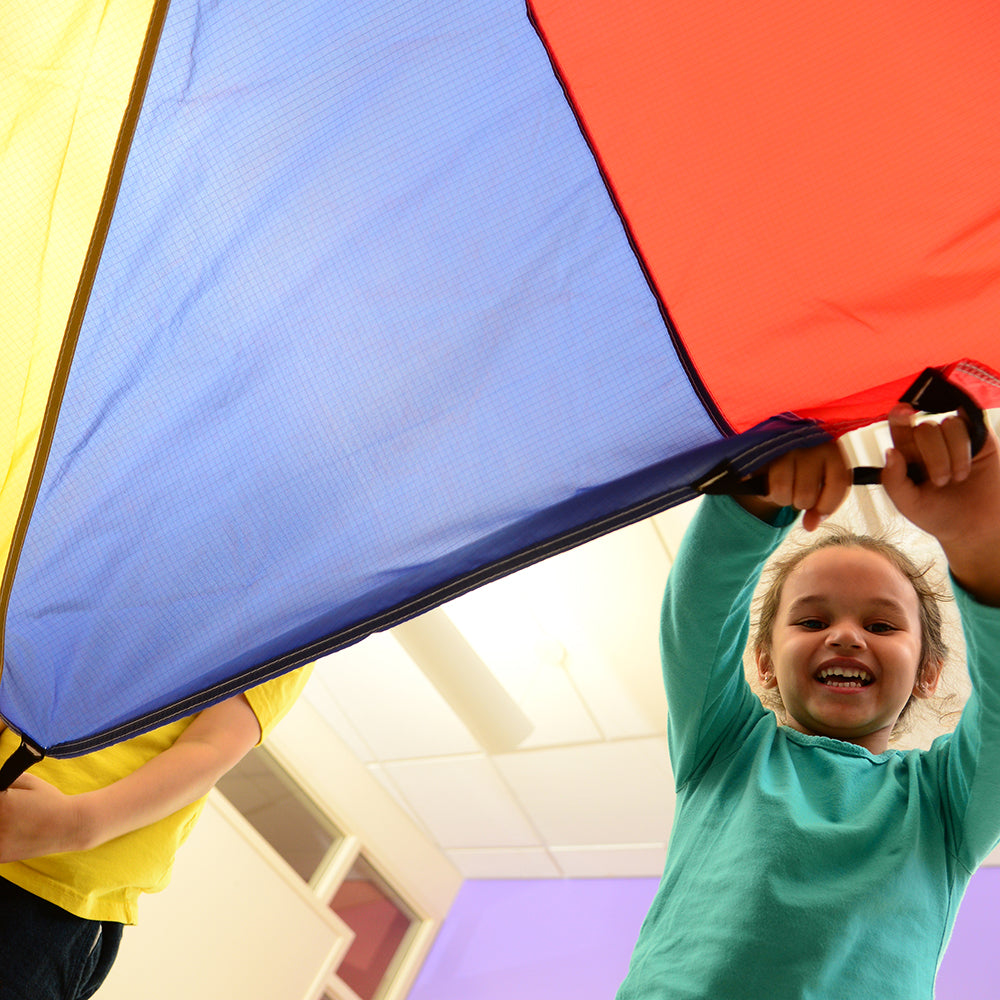 Close-up of Kid Using Handles on 6 FT Parachute in Classroom