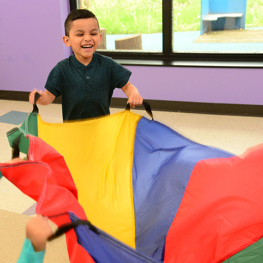 Kid Using Handles on 6 FT Parachute in Classroom