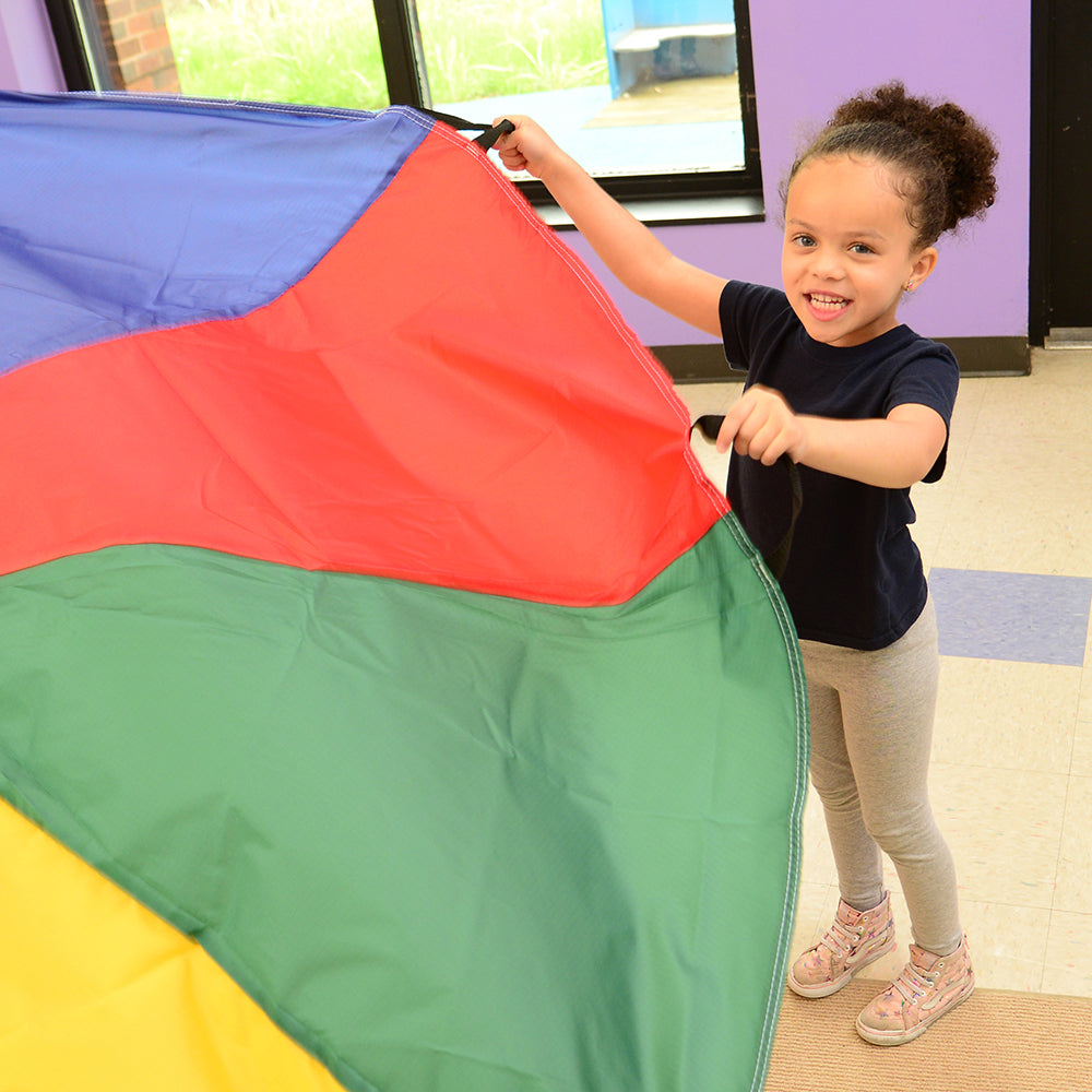 Kid Using Handles on 6 FT Parachute in Classroom