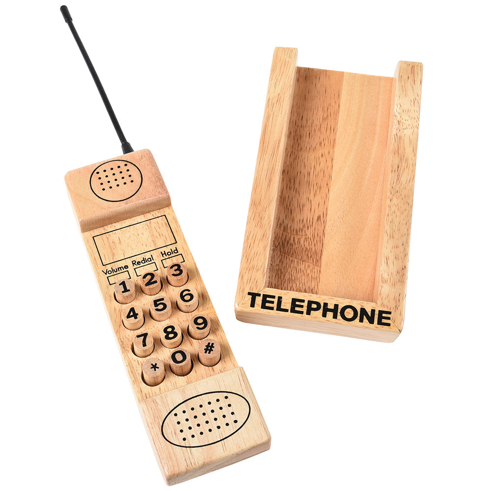 A wooden toy telephone with a cradle, dial pad, and antenna, featuring vintage design.