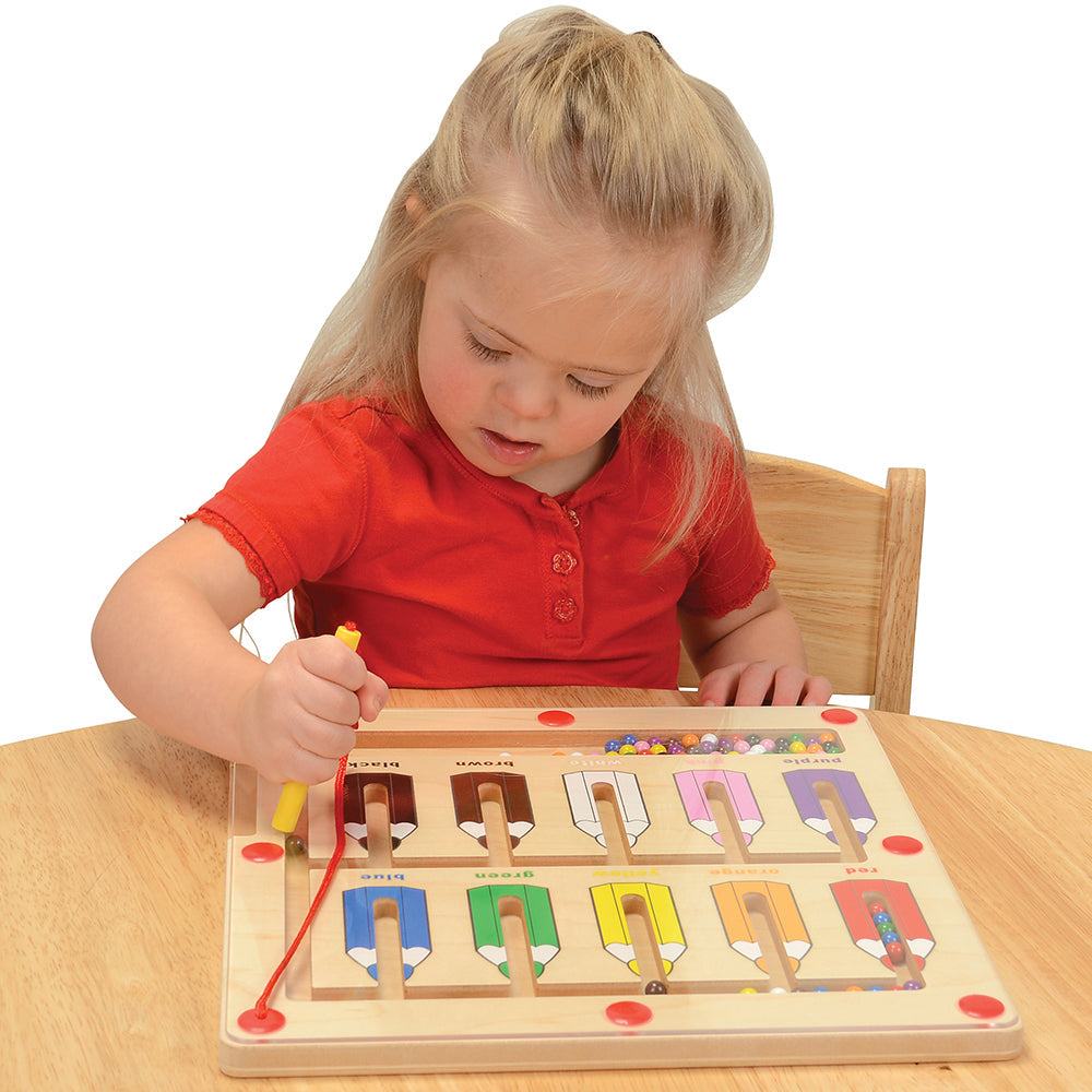 Child Sorting Colors with Magnetic Color Matching Game
