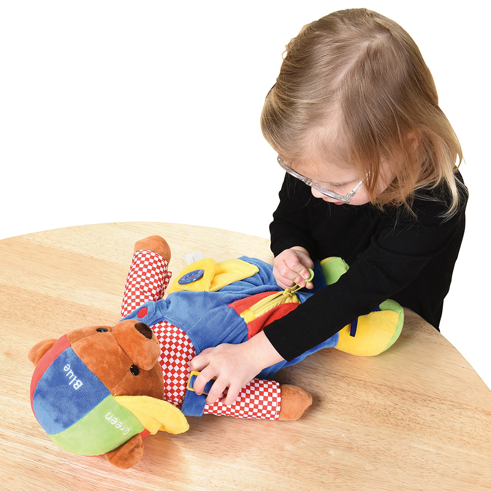 Pulling Zipper on Learn & Play Teddy