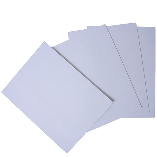 A stack of white construction paper sheets.