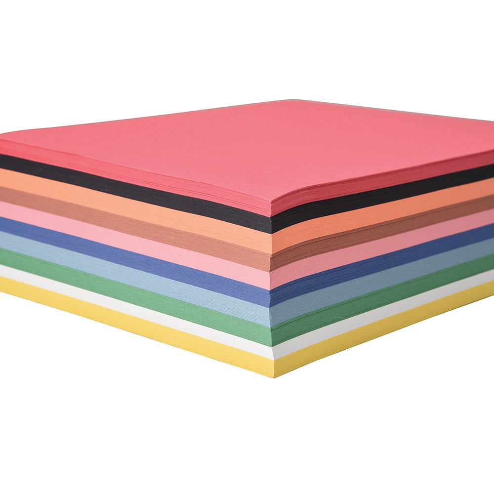 A stack of assorted construction paper sheets, with colors including red, pink, blue, green, yellow, orange, and black.