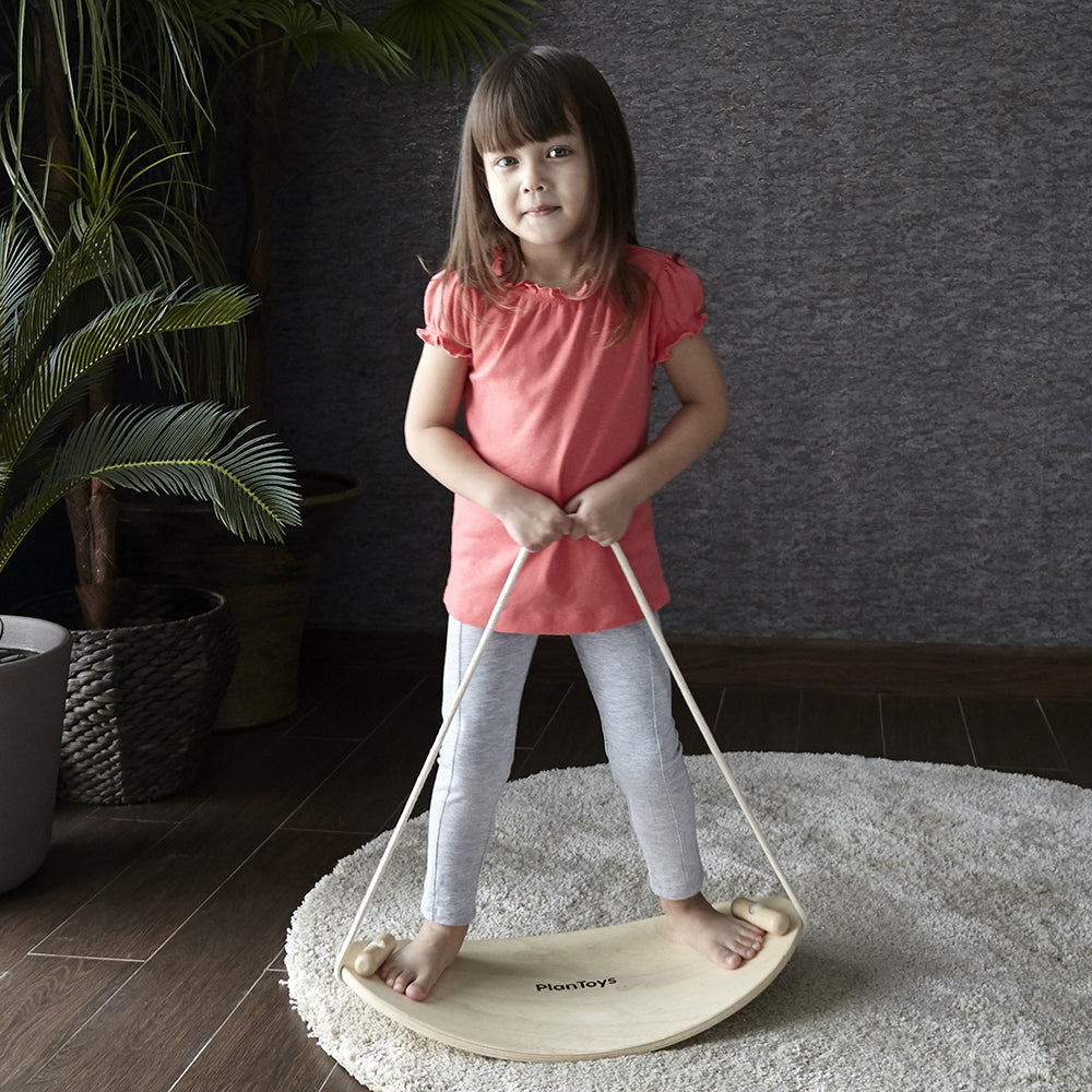 Kid Using Balance Board