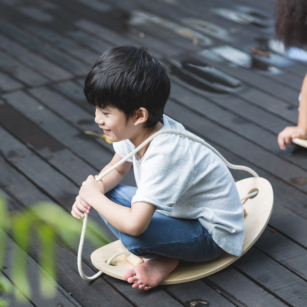 Kid Being Active with Balance Board