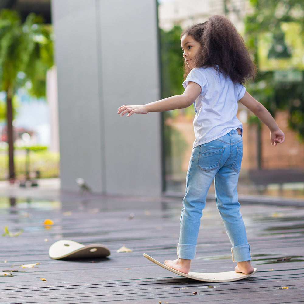 Kid Balancing on Board
