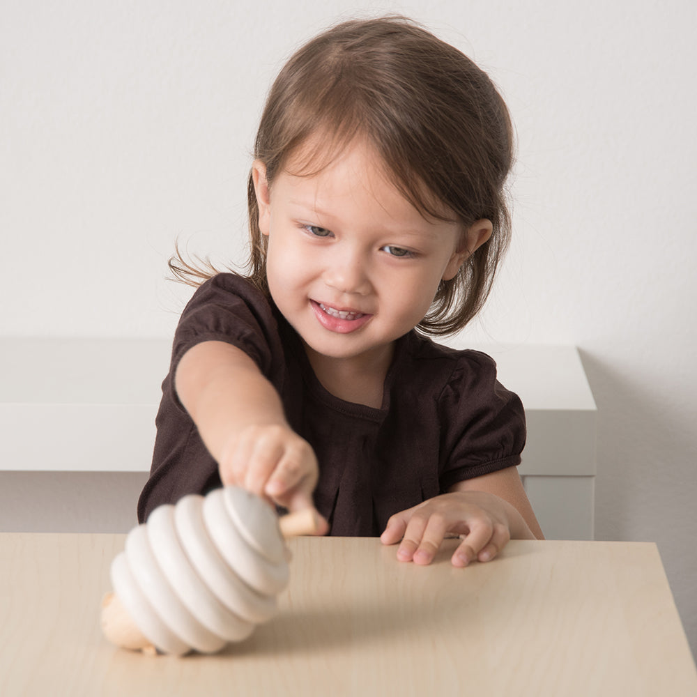 Toddler Engaging With Wooden Lacing Sheep Manipulative