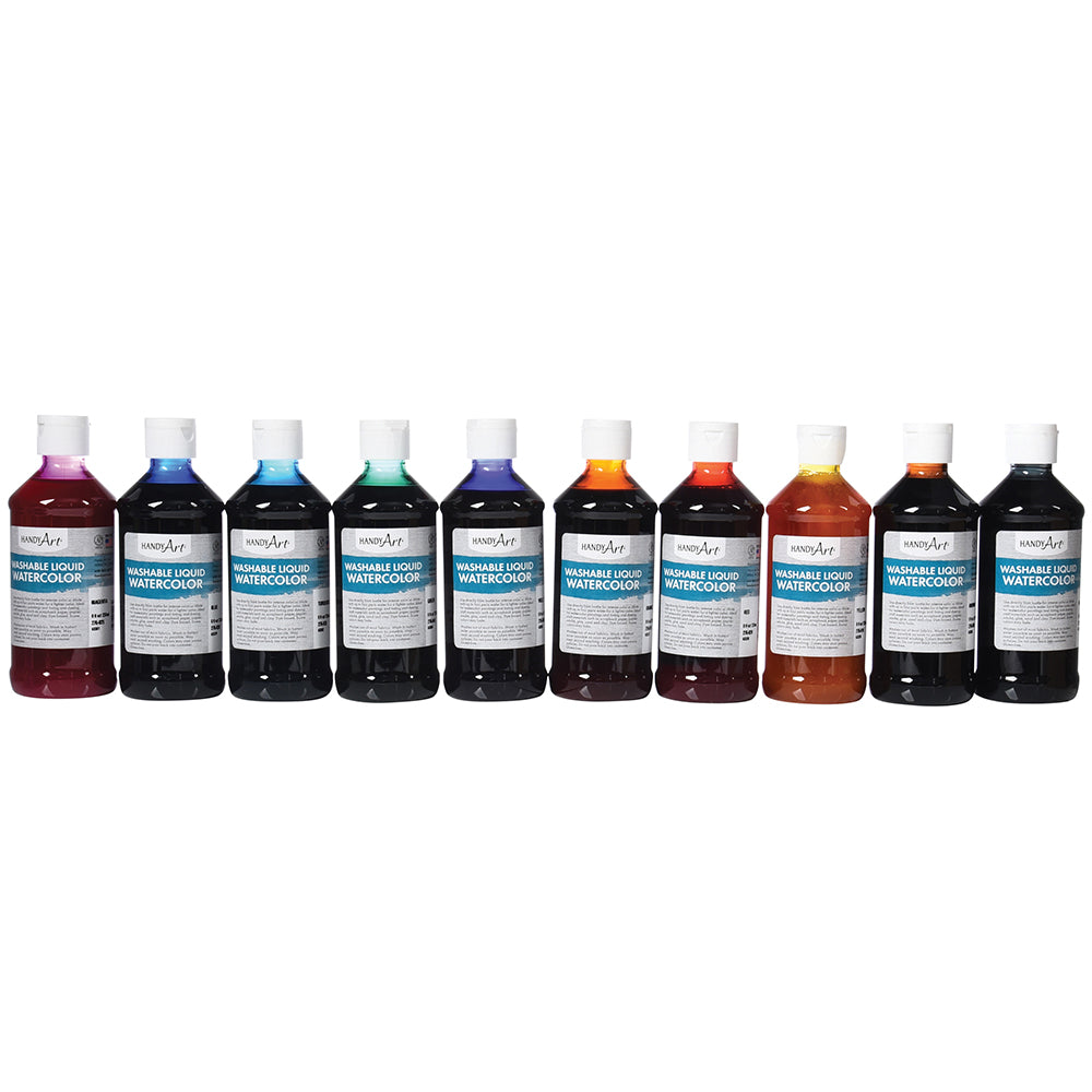 Set of 12 bottles of watercolor paints on a white background