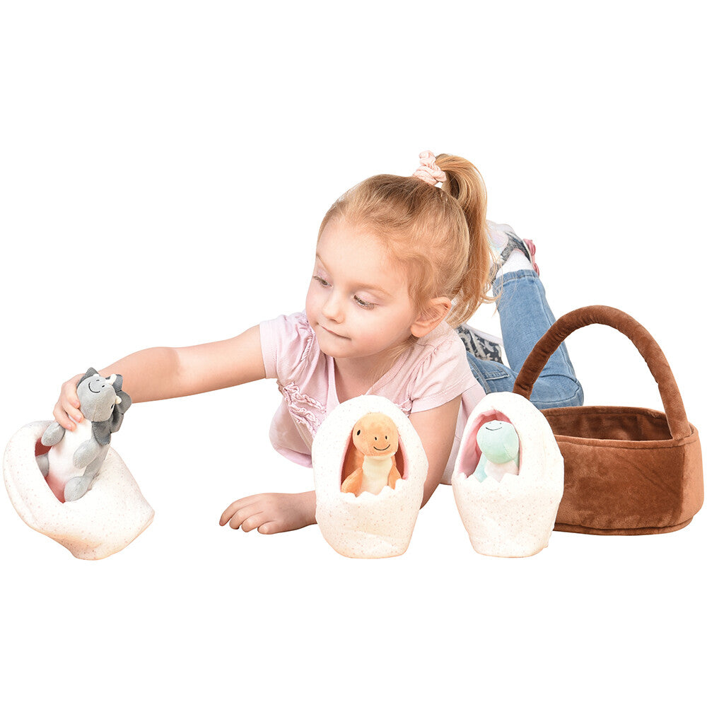 Kid Engaging With Plush Basket of Dinos