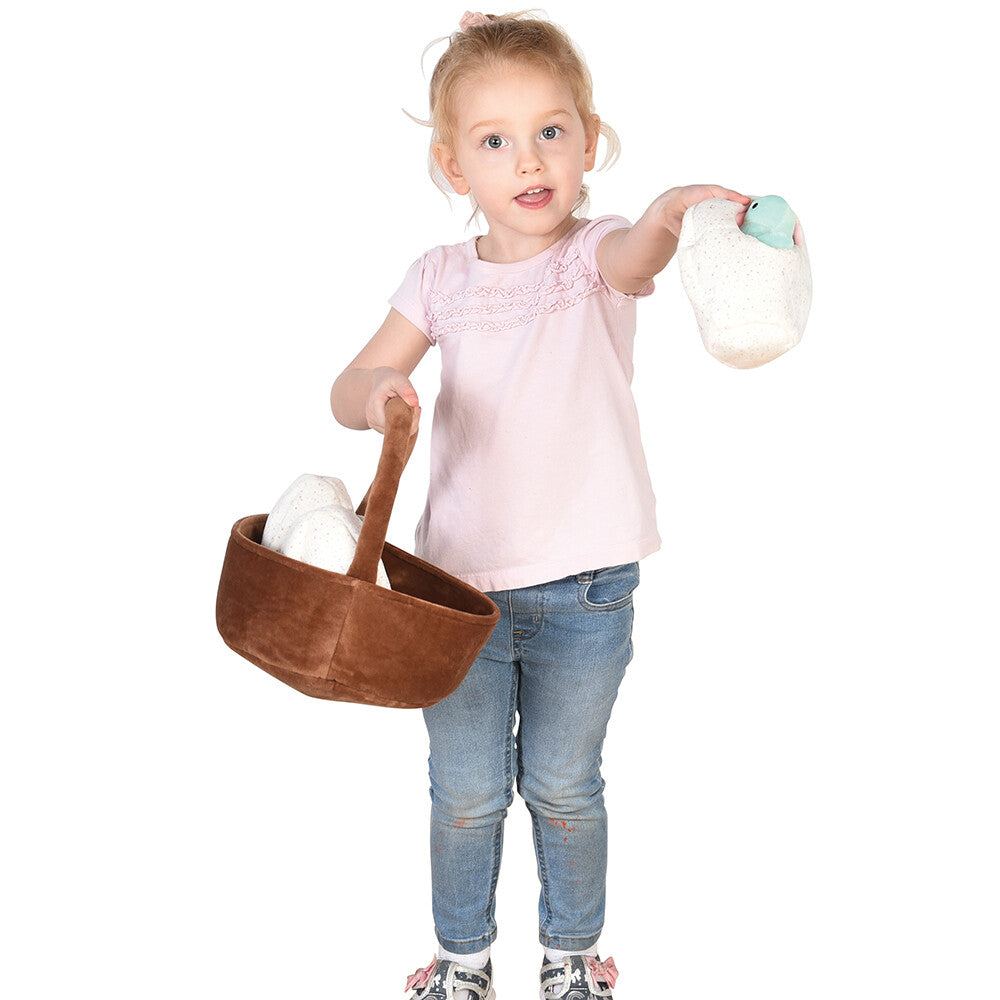 Kid with Basket of Dinos in Their Eggs