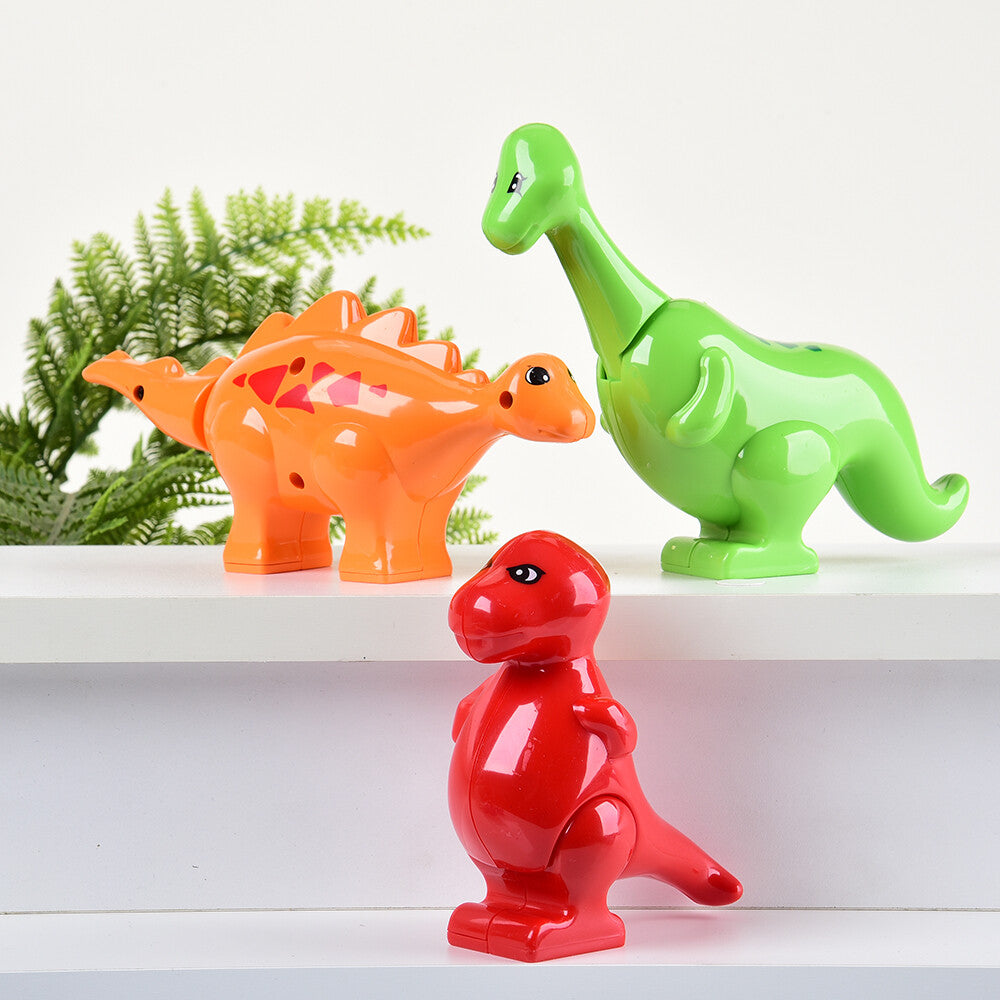 three dinosaur block animals on white background
