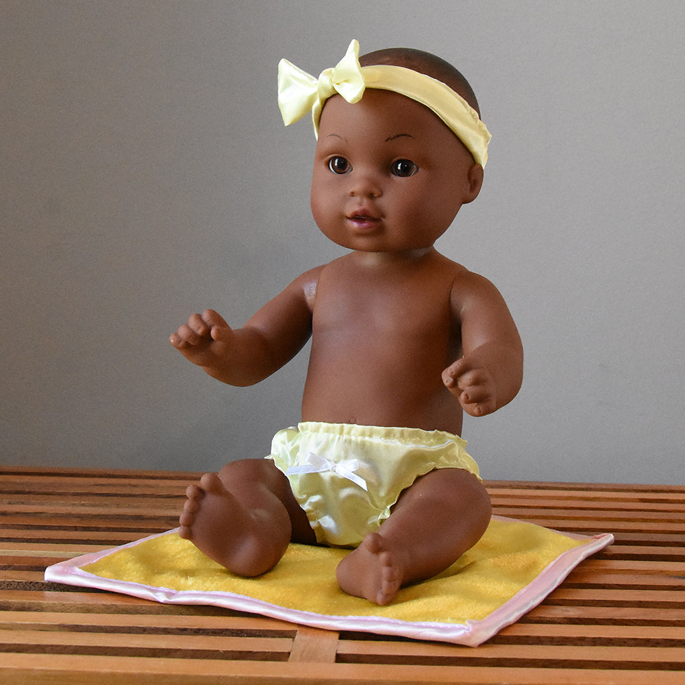 Ultra-Soft & Realistic Tender Touch African American Baby Doll Seated on Blanket