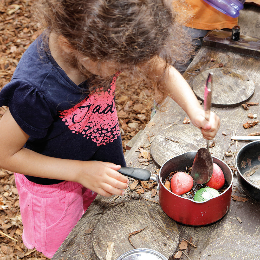 Mud Kitchen Fun with Fruit Stones