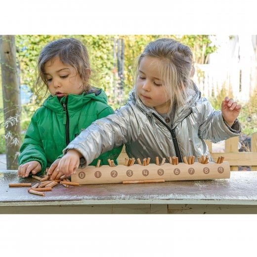 Two Kids Using Eco-Friendly Wooden Counting Log with Sticks While Outside