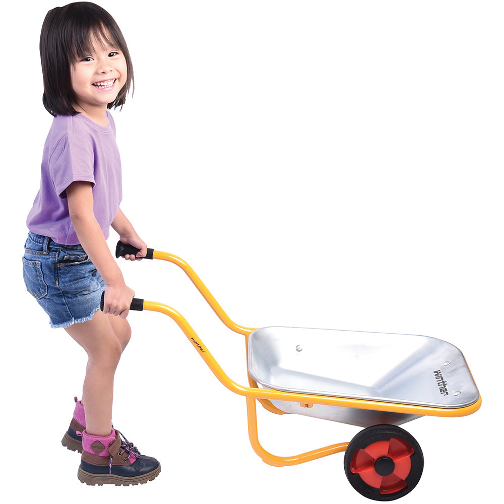 Kid Posing With Wheelbarrow