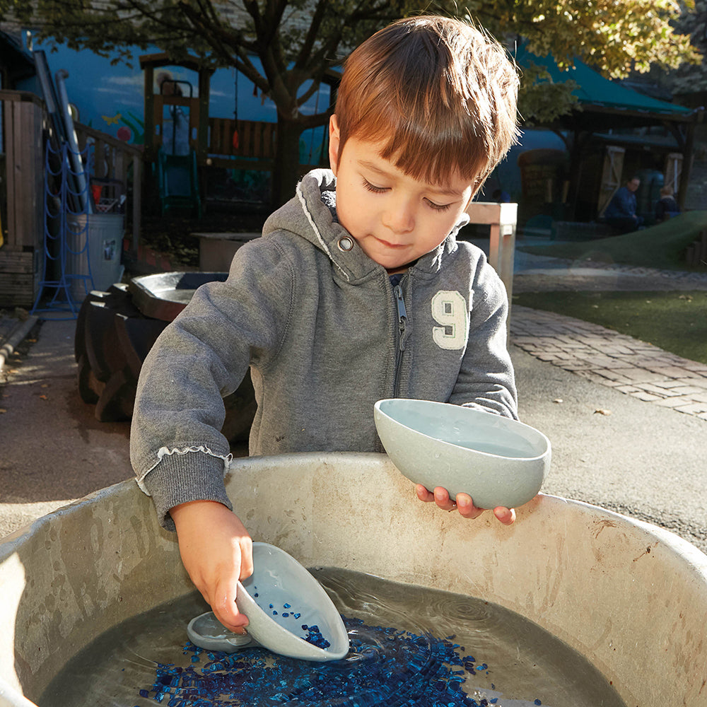 Scooping Water during Sensory Play
