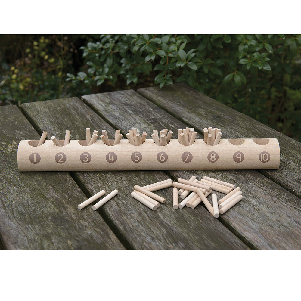 Eco-Friendly Wooden Counting Log with Sticks | Natural Early Math Toy Shown Outside