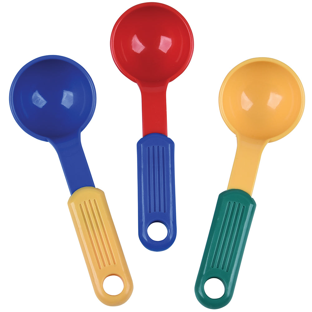 Set of three colorful measuring spoons on a white background