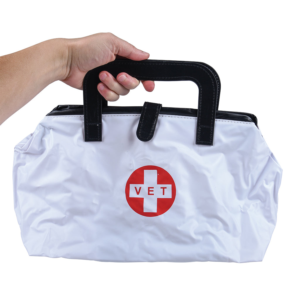 White bag with a red 'VET' symbol held by a hand against a white background