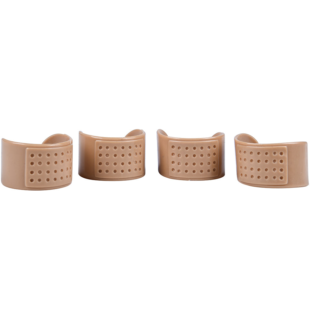 Set of four beige silicone wristbands with holes on a white background