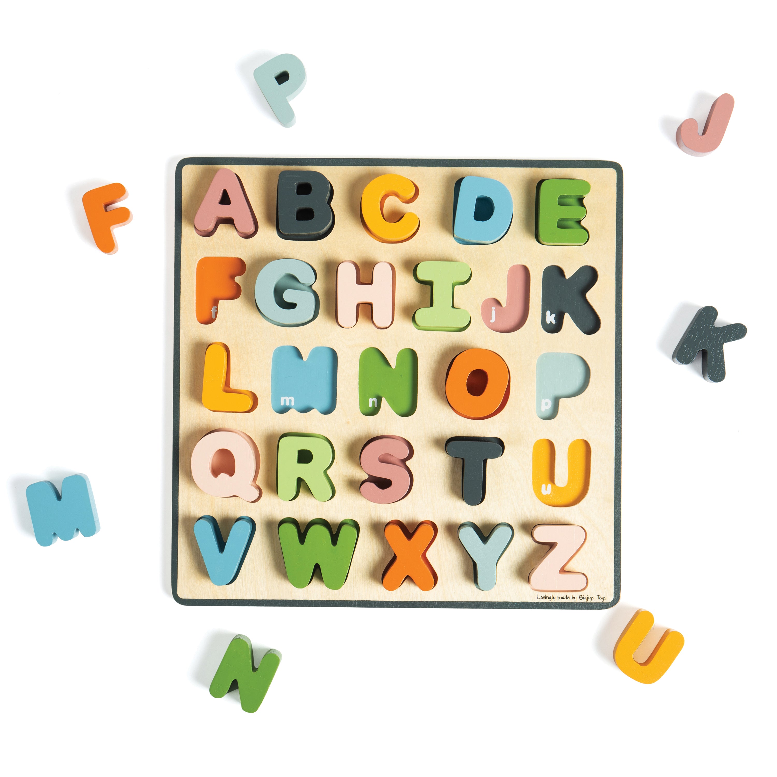 Colorful wooden alphabet letters on a white background
