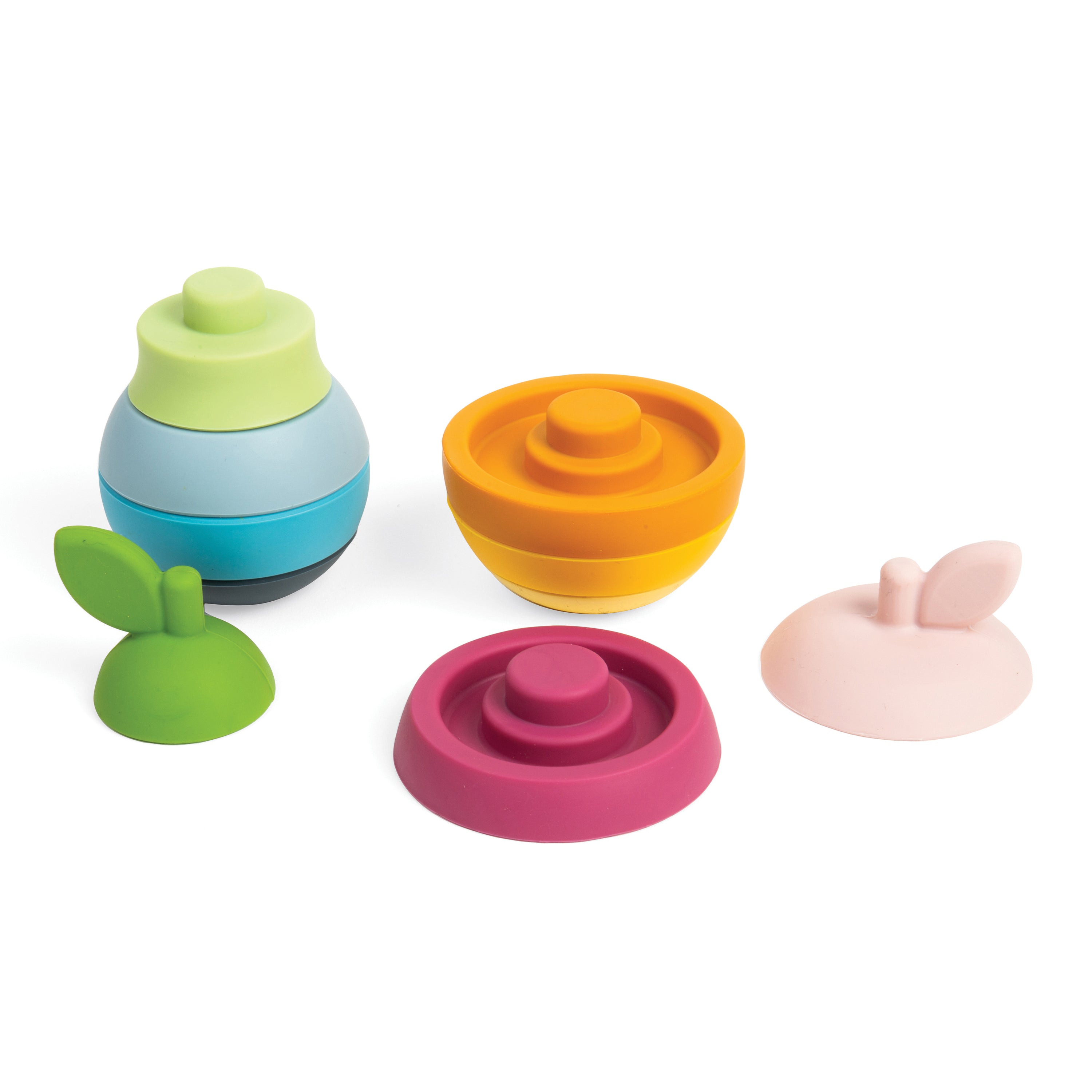 Set of colorful plastic toys on a white background