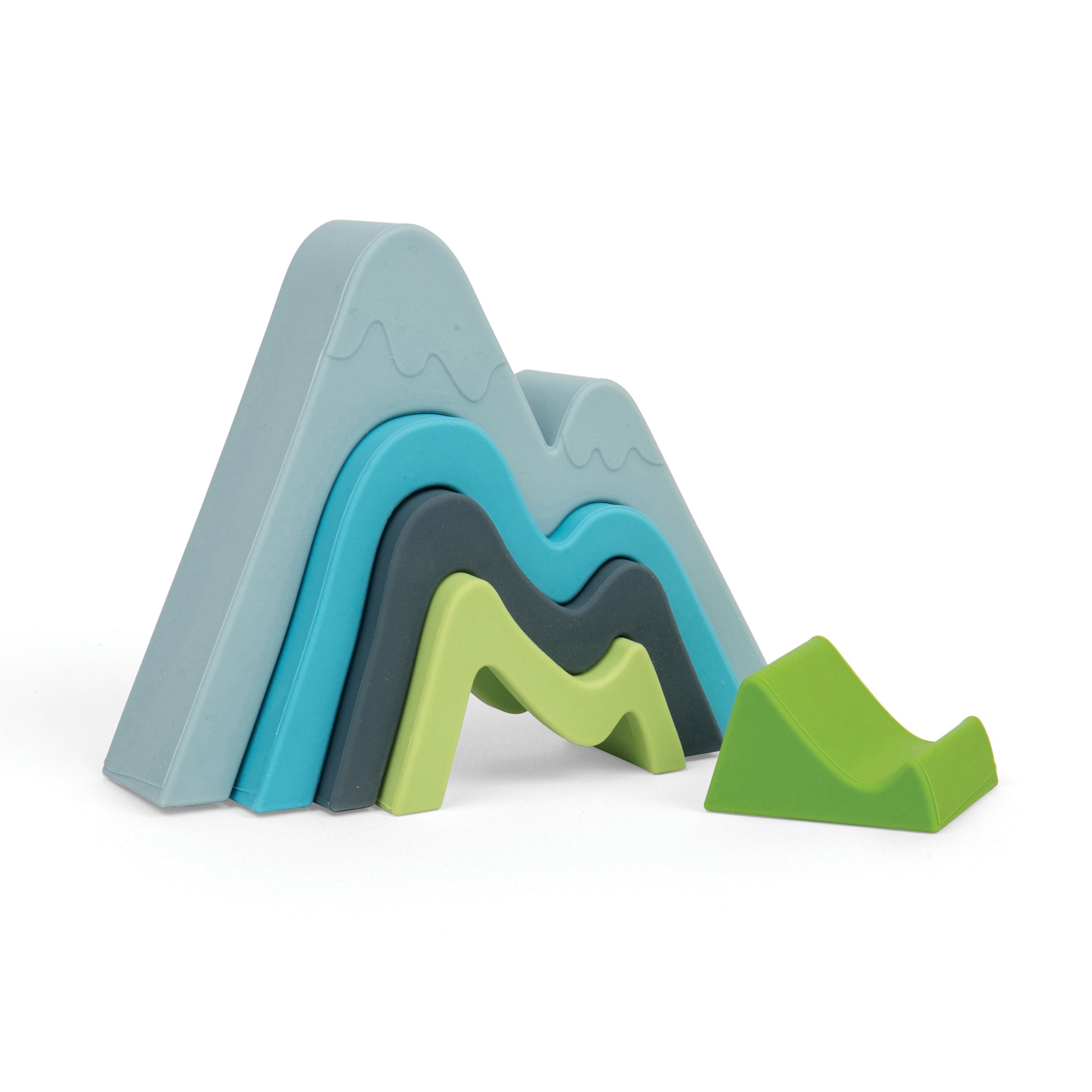 Stack of colorful plastic mountain blocks on a white background
