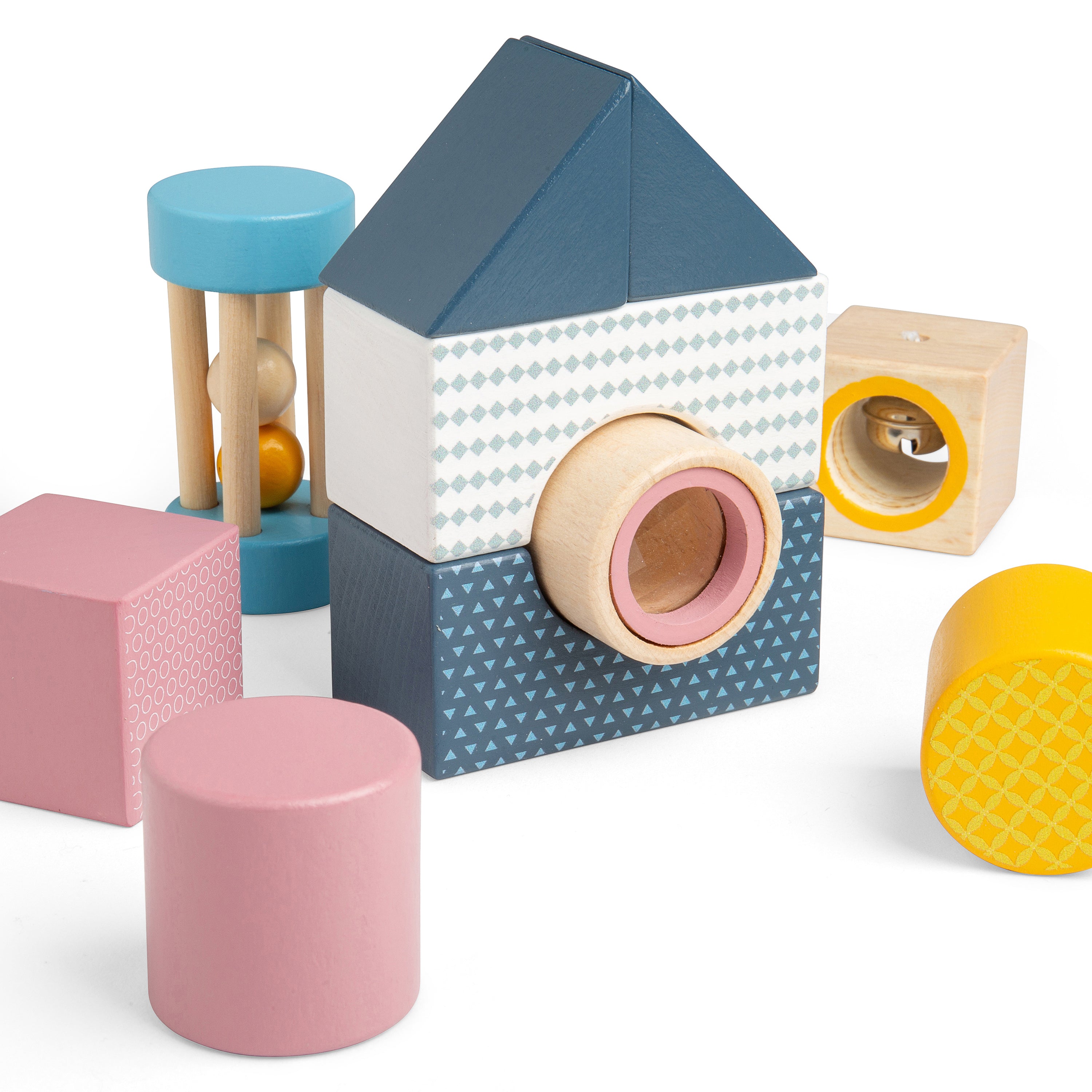 Colorful wooden toy set with geometric shapes on a white background