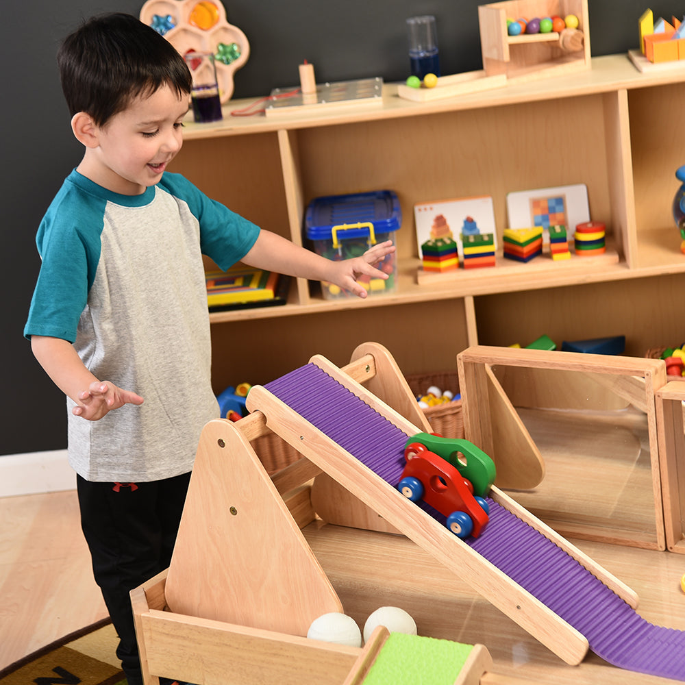 Using Wooden Cars to Roll Down Ramp