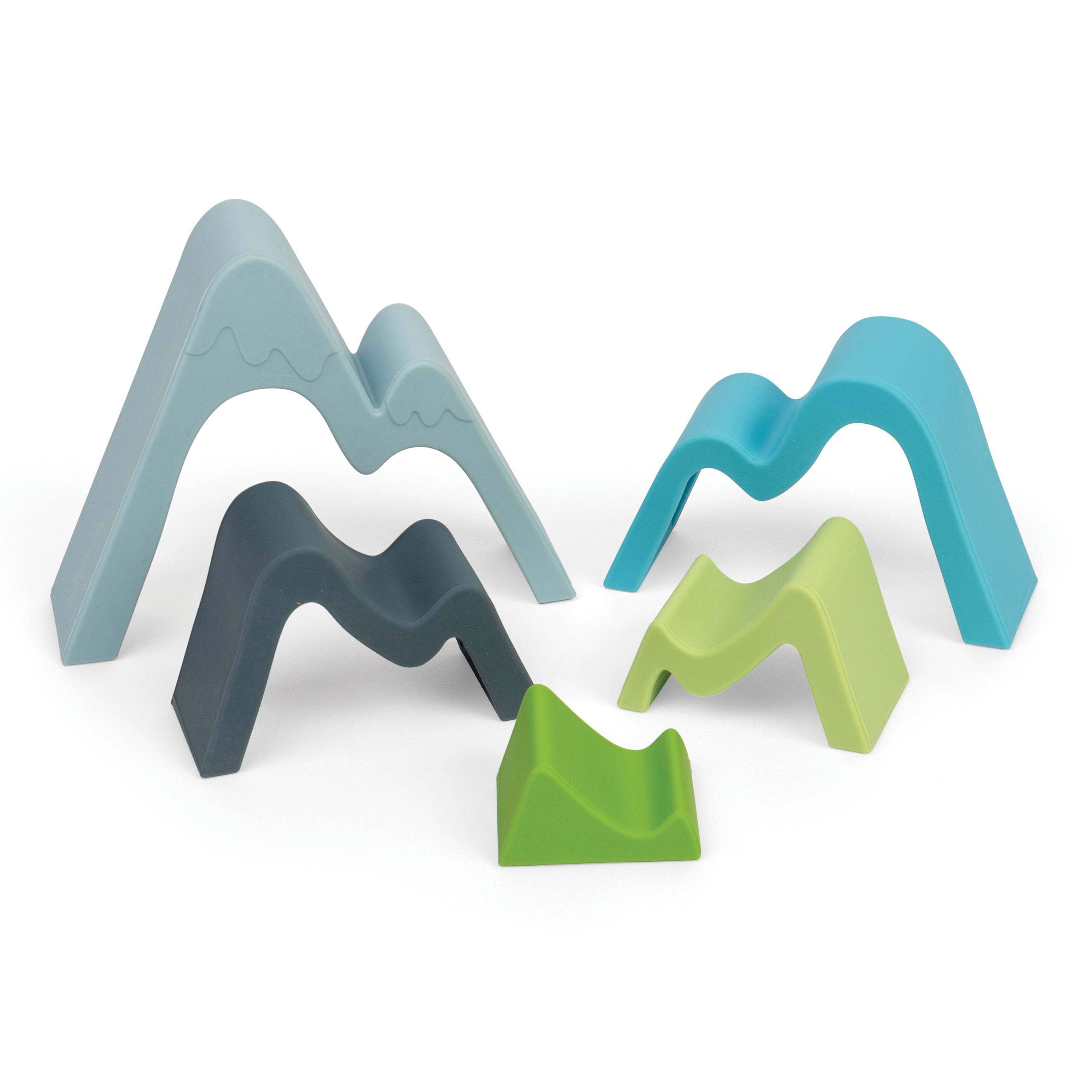 Set of colorful mountain-shaped blocks on a white background