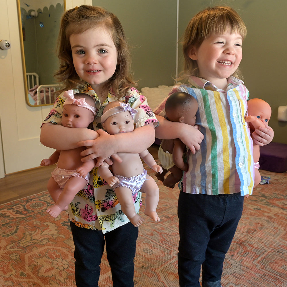 Two Toddlers with Multi-Ethnic Tender-Touch Baby Dolls