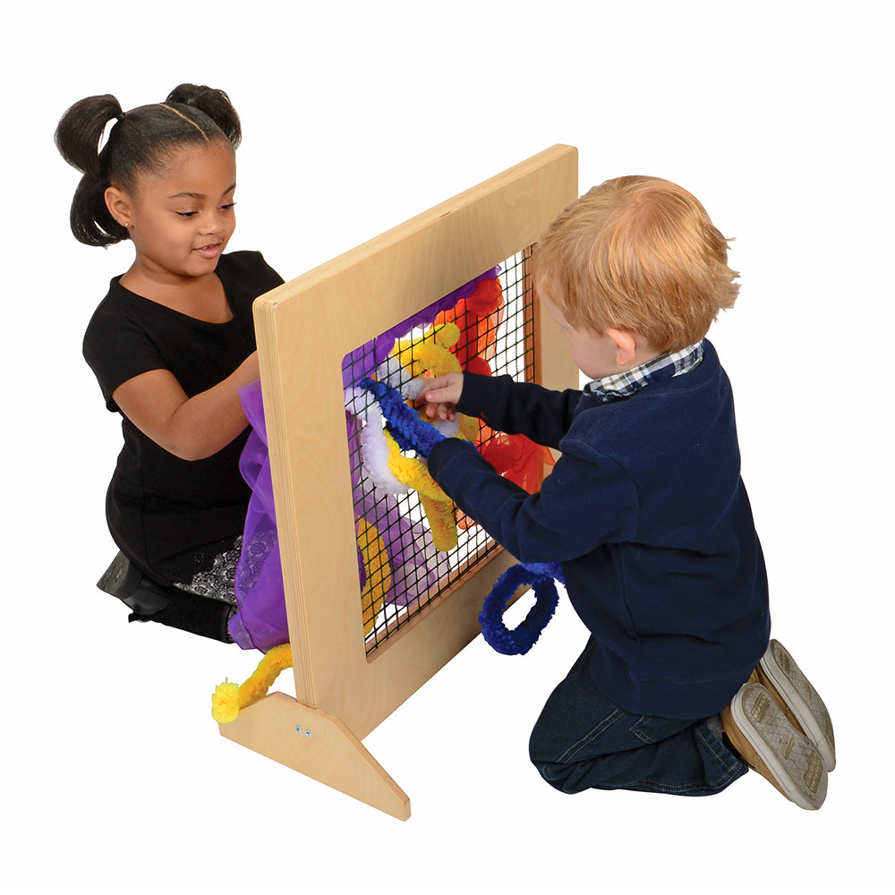 Two Kids Exploring Weaving Frame