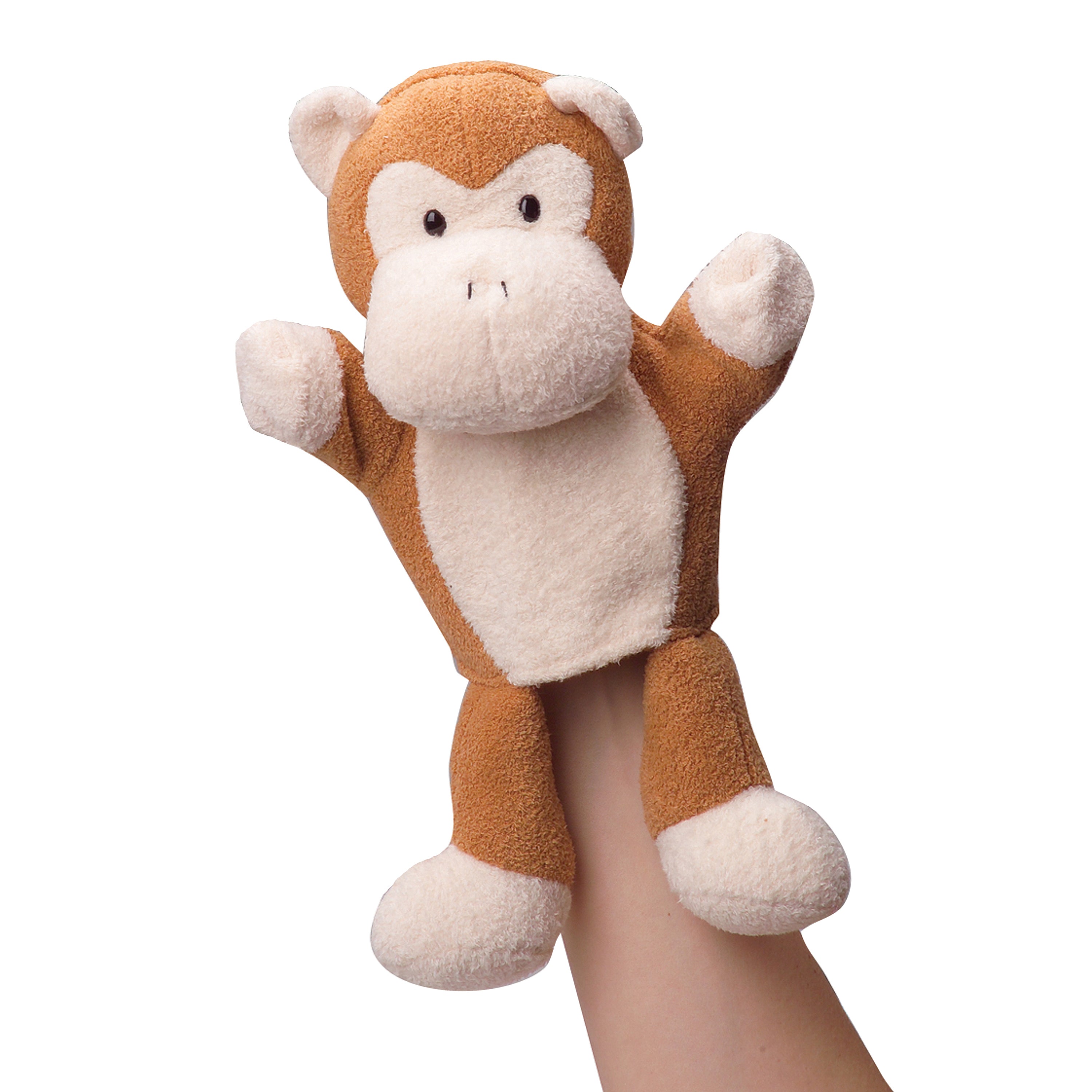 Plush monkey toy held by a hand on a white background