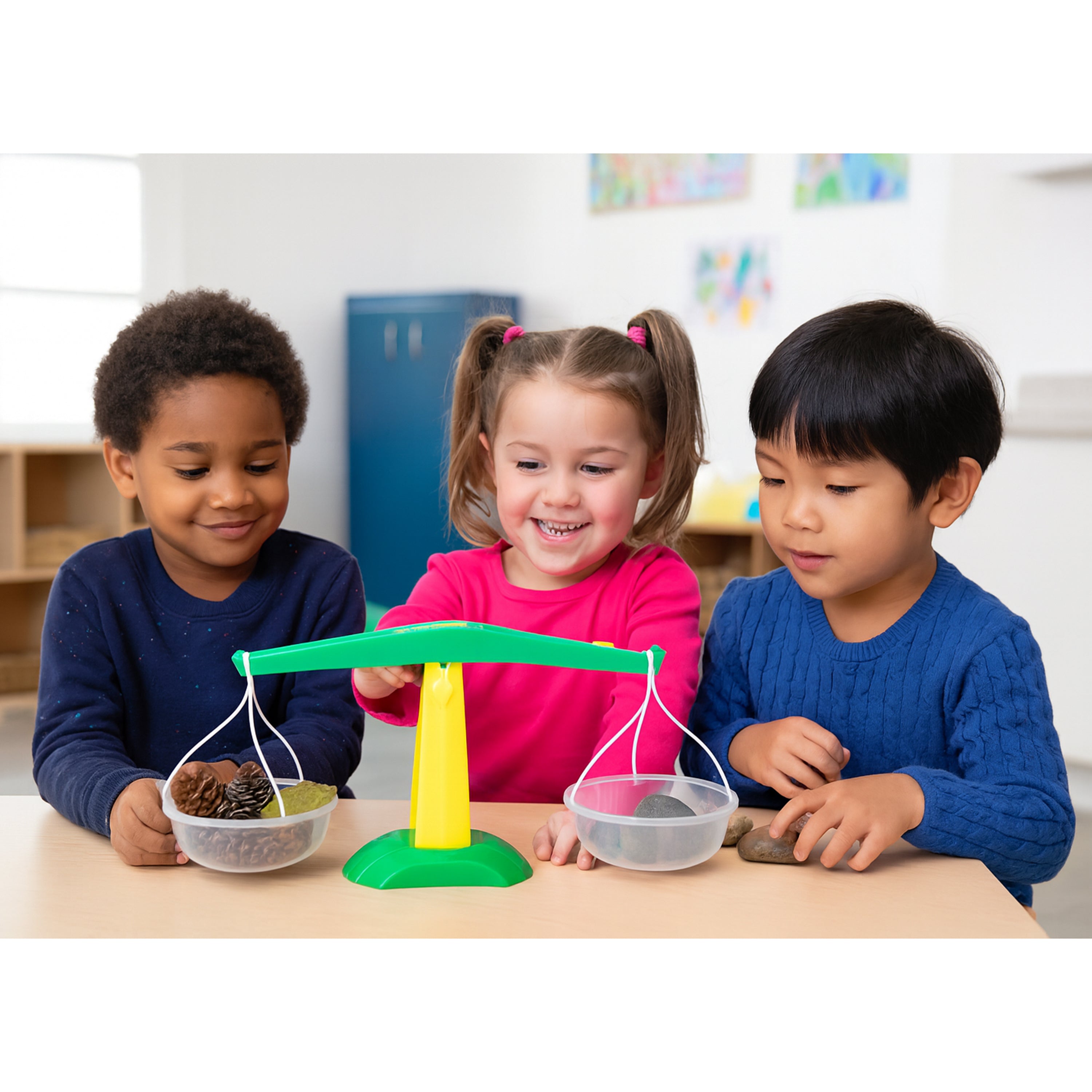 Three children playing with a balance scale toy in a classroom setting.