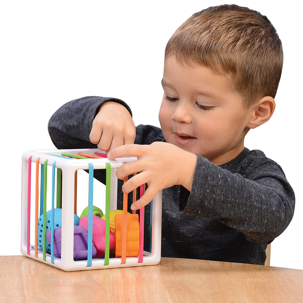 Kid Exploring Sensory Shape-Sorting Cube